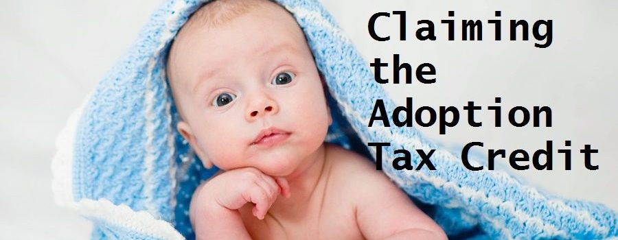 Portrait of a cute smiling infant baby crawling in a diaper, two-month baby child holds head